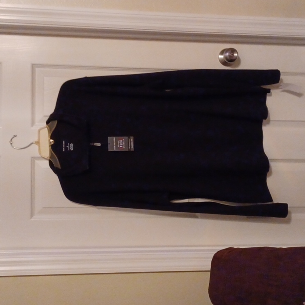 Selling a Van Heusen dress sweater in new condition with tags.  Black size Large